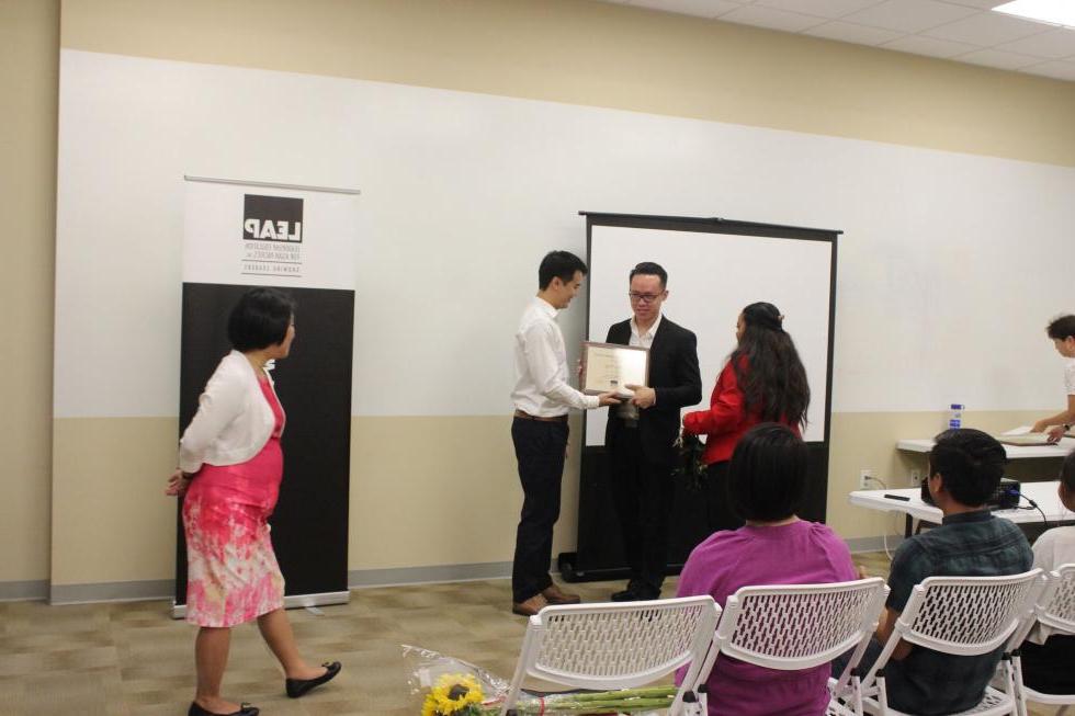 Tony Tang awarded a certificate at LEAP